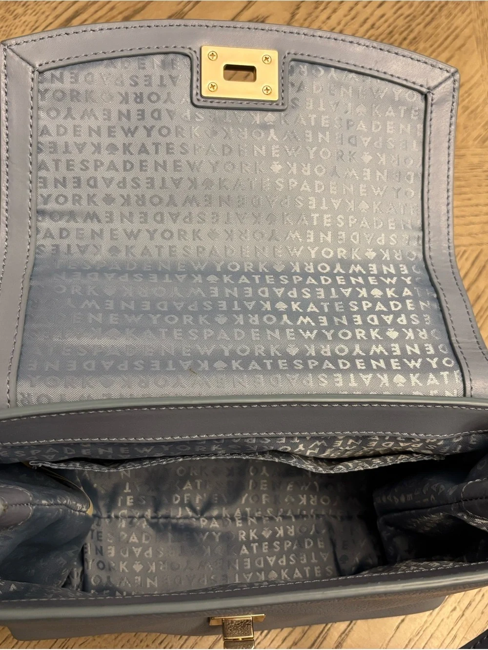 kate spade light blue satchel with pearls and gold studs